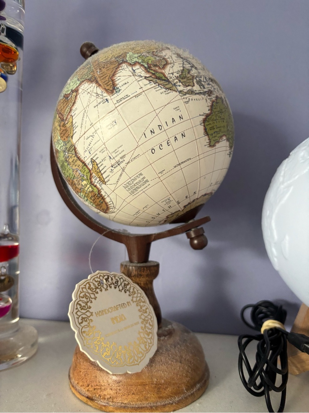 Vintage-Style Cream and Green World Globe on Wooden Stand